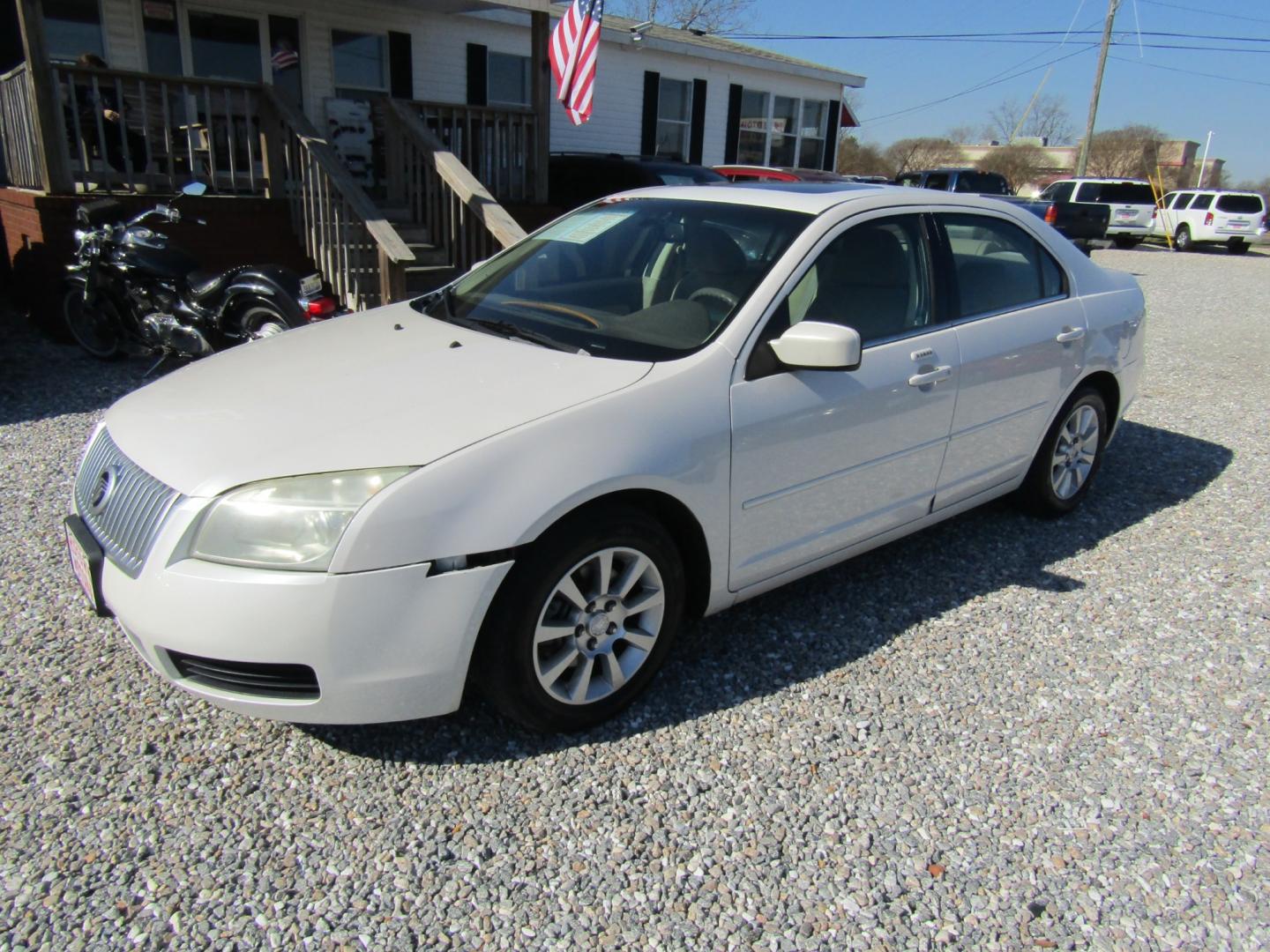 2009 CREAM /Tan Mercury Milan I4 (3MEHM07Z19R) with an 2.3L L4 DOHC 16V engine, Automatic transmission, located at 15016 S Hwy 231, Midland City, AL, 36350, (334) 983-3001, 31.306210, -85.495277 - Photo#2